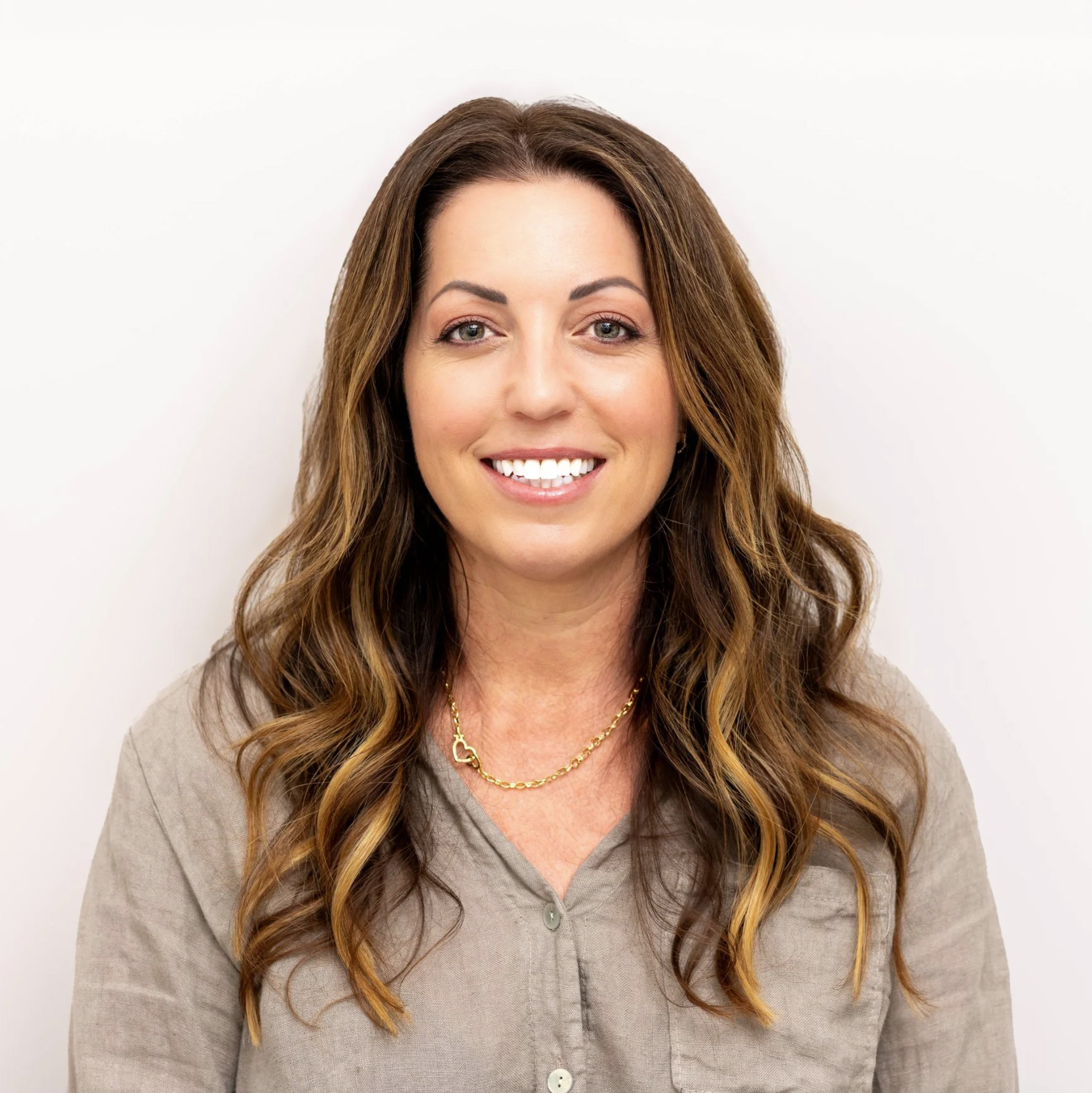 Rebecca smiling with glasses