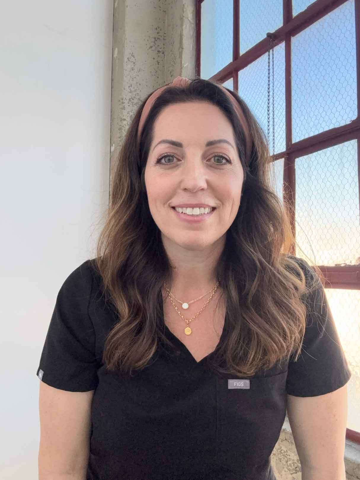 Rebecca Turley seated