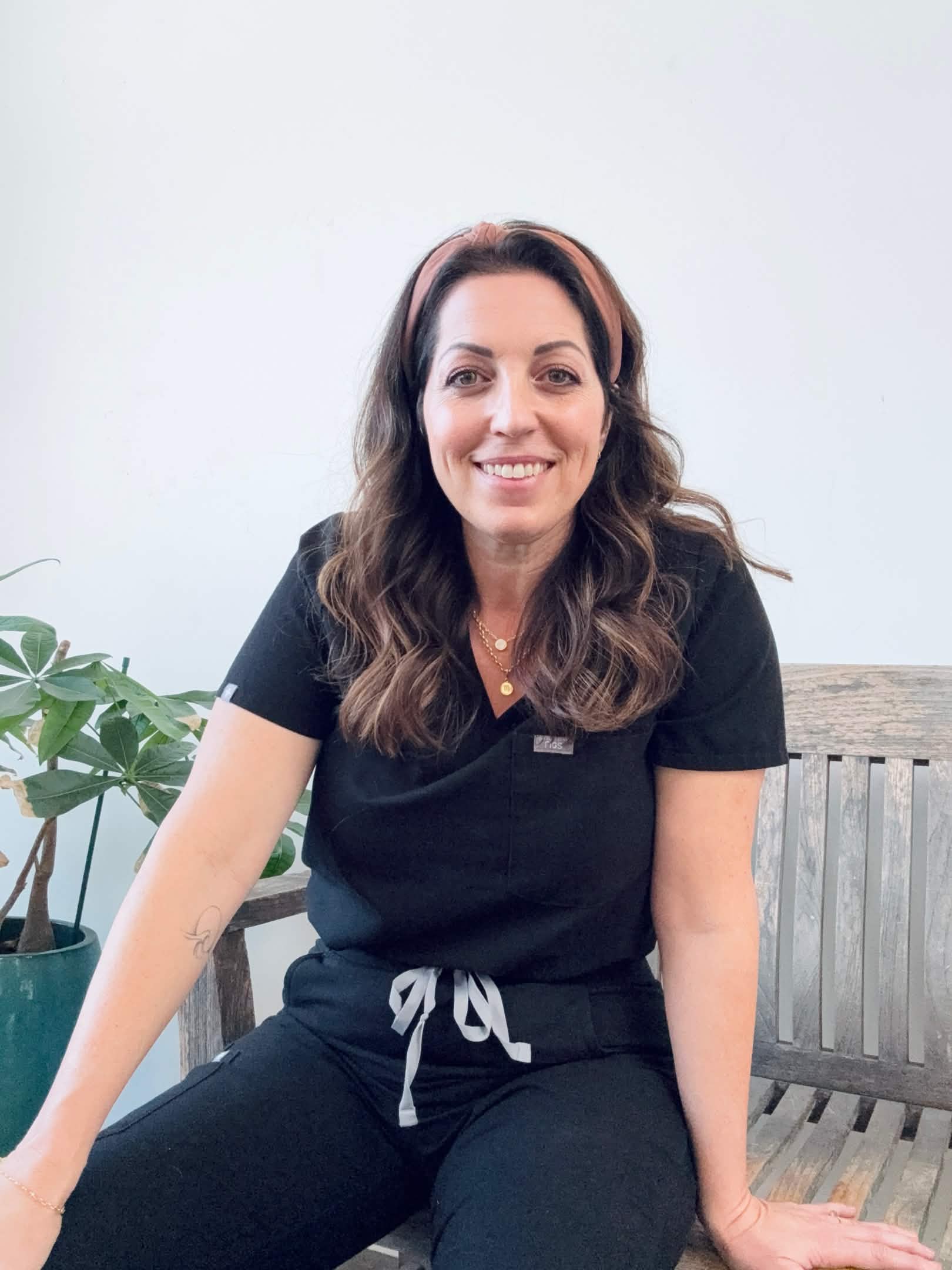 Rebecca smiling with glasses